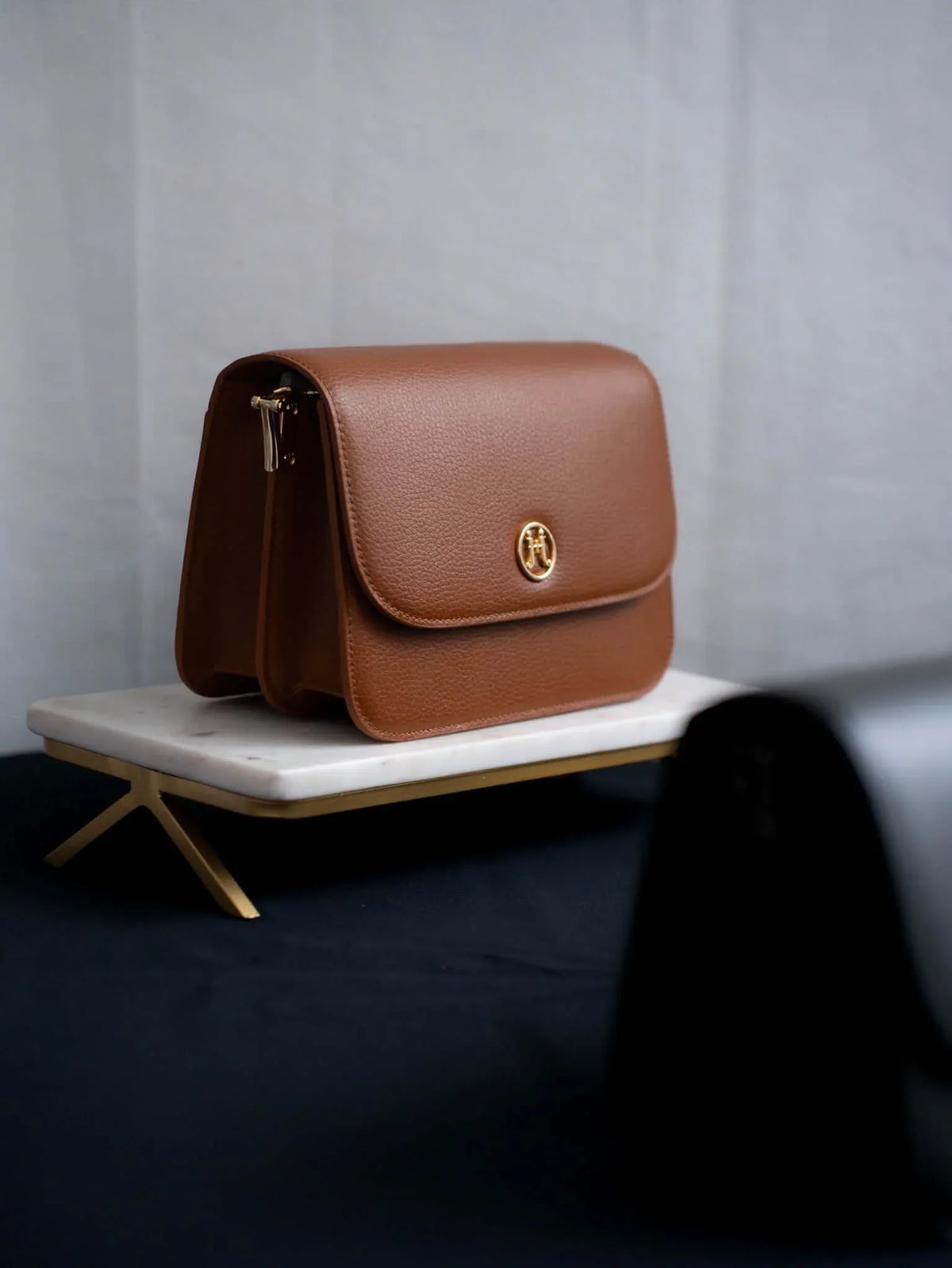 jeane + jax MIRUM crossbody bag shown in a contemporary interior