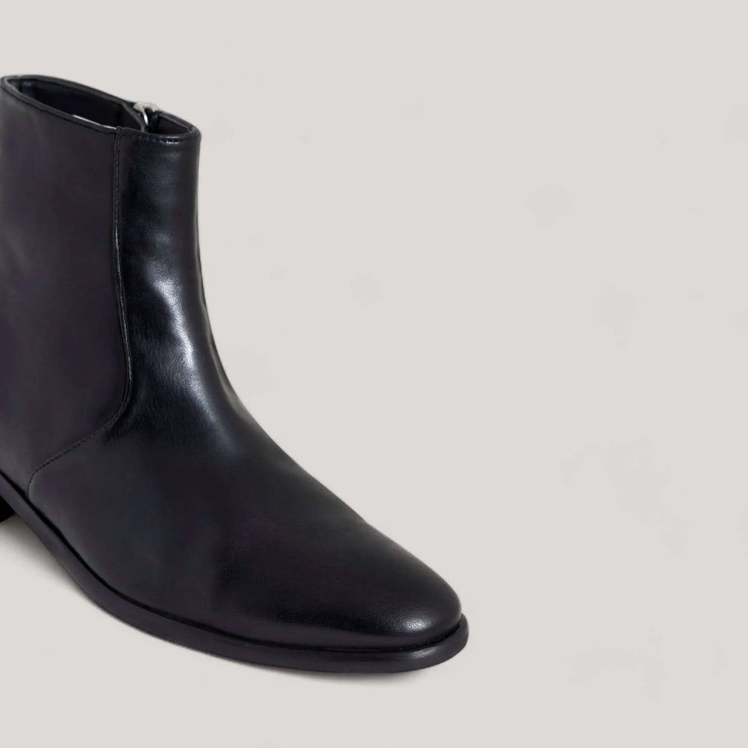 Black vegan Nappa ankle boot by CHARLI, crafted in Italy. Sustainable, luxurious vegan shoes by AERA. Styled like Stella McCartney shoes.