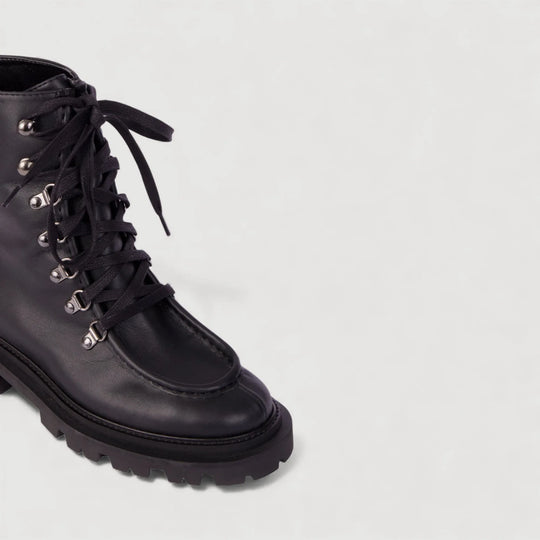 AMALIA | Black - Lace-up Boots by AERA NEW YORK, luxury vegan shoes with polished silver hardware and lug sole.