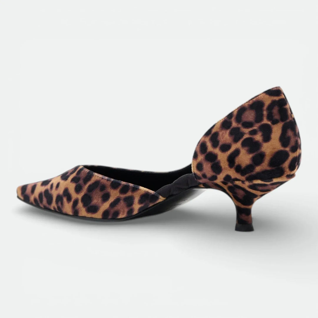 Leopard print kitten heel pump with pointed toe on white background