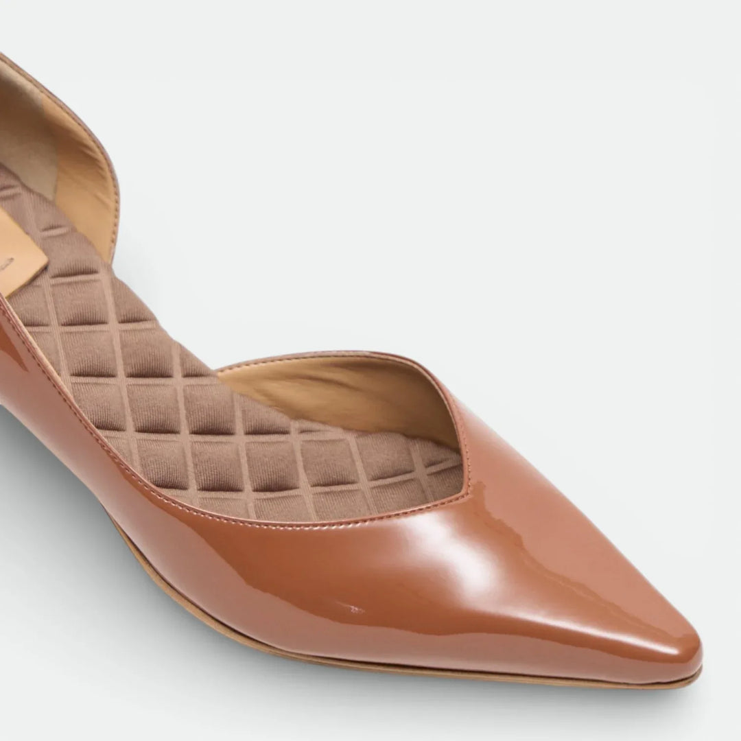 Mocha brown pointed toe flat shoe with quilted cushioned insole on white background