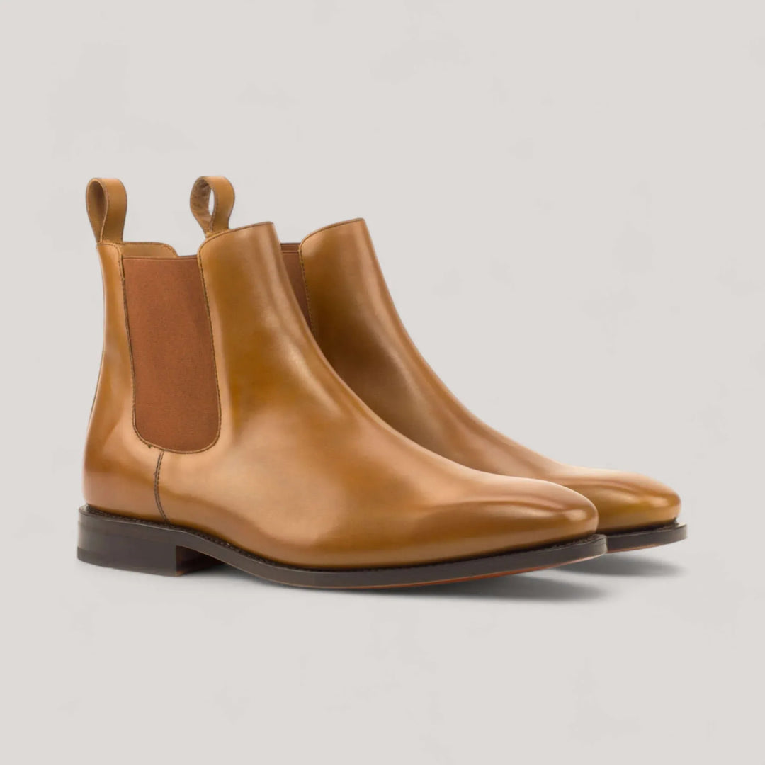 Pair of cognac box-calf Chelsea boots, front three-quarter view