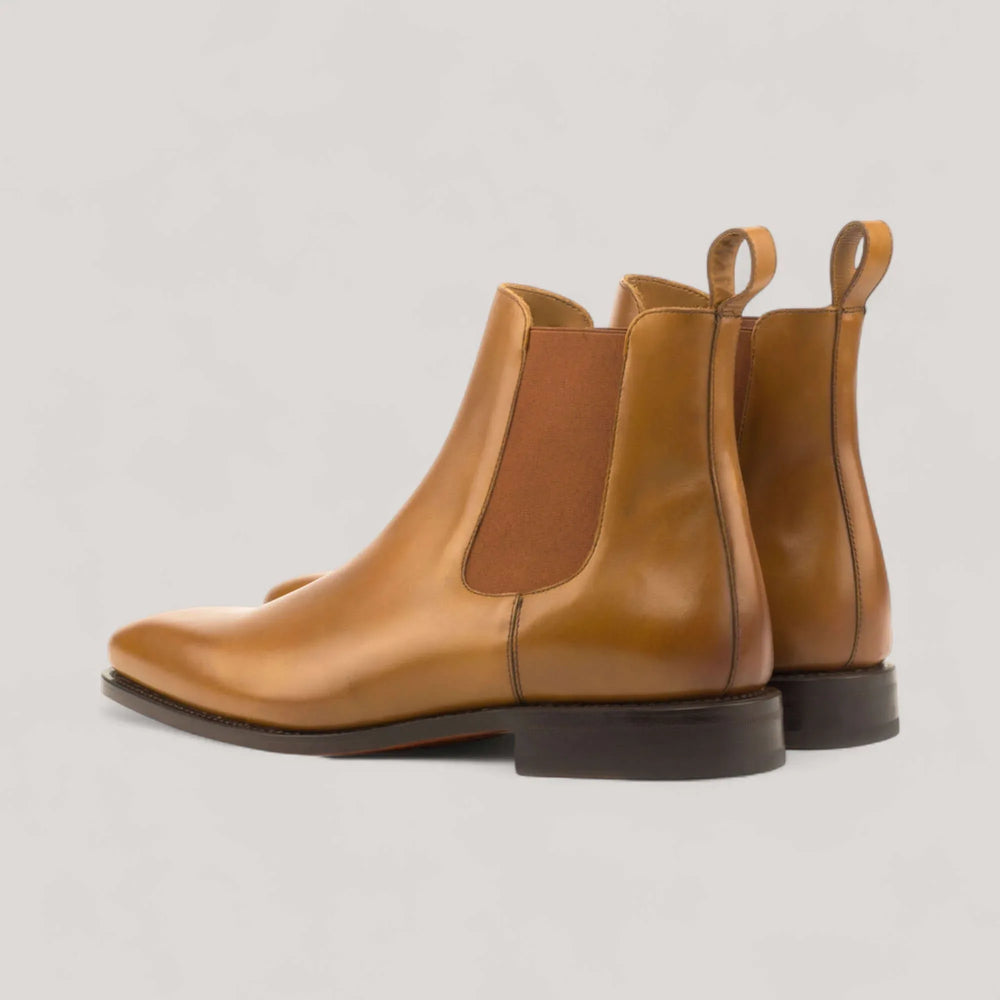 Pair of cognac box-calf Chelsea boots, rear three-quarter view