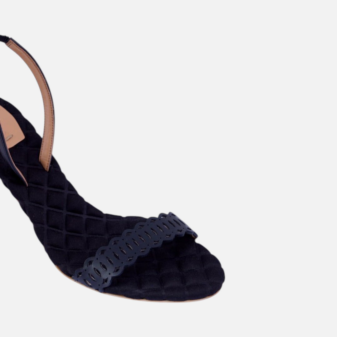 AERA CLAUDIA black nappa-effect slingback sandal, close-up of the front strap and quilted footbed.