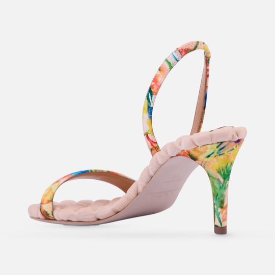 AERA CLAUDIA floral-print satin slingback sandal, rear three-quarter view showing the heel and sole.