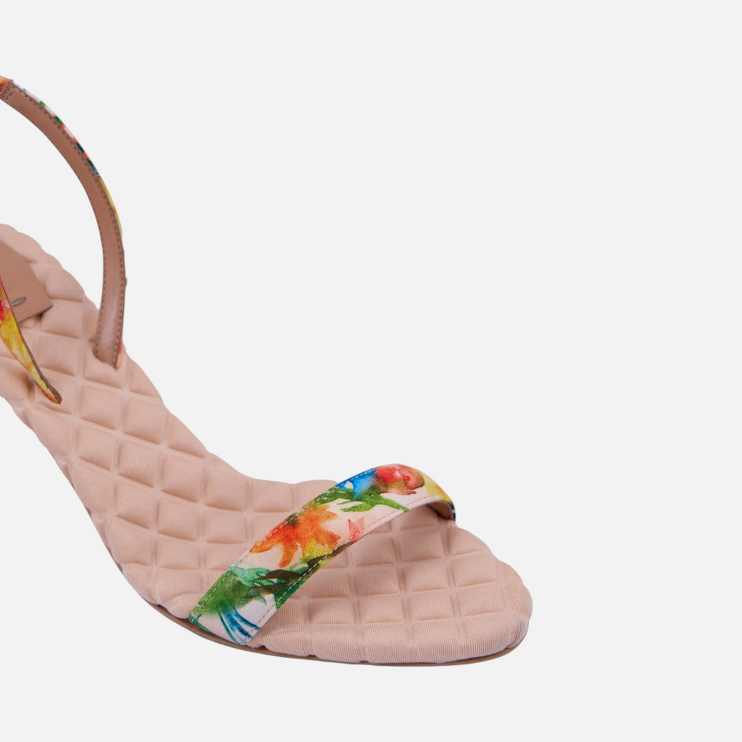 AERA CLAUDIA floral-print satin slingback sandal, close-up of the front strap and quilted footbed.