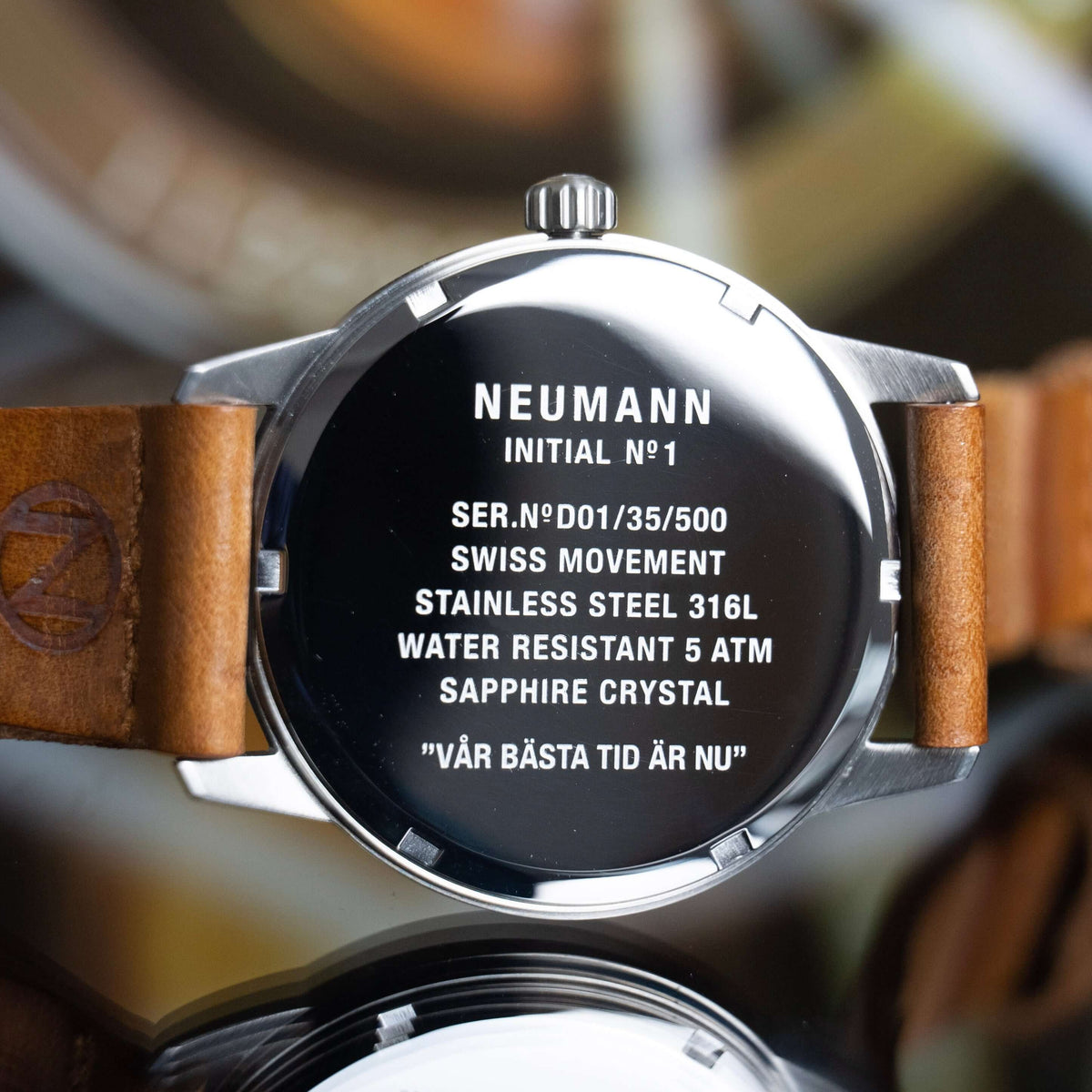 Engraved caseback and crown of a Neumann Initial Nº1 watch