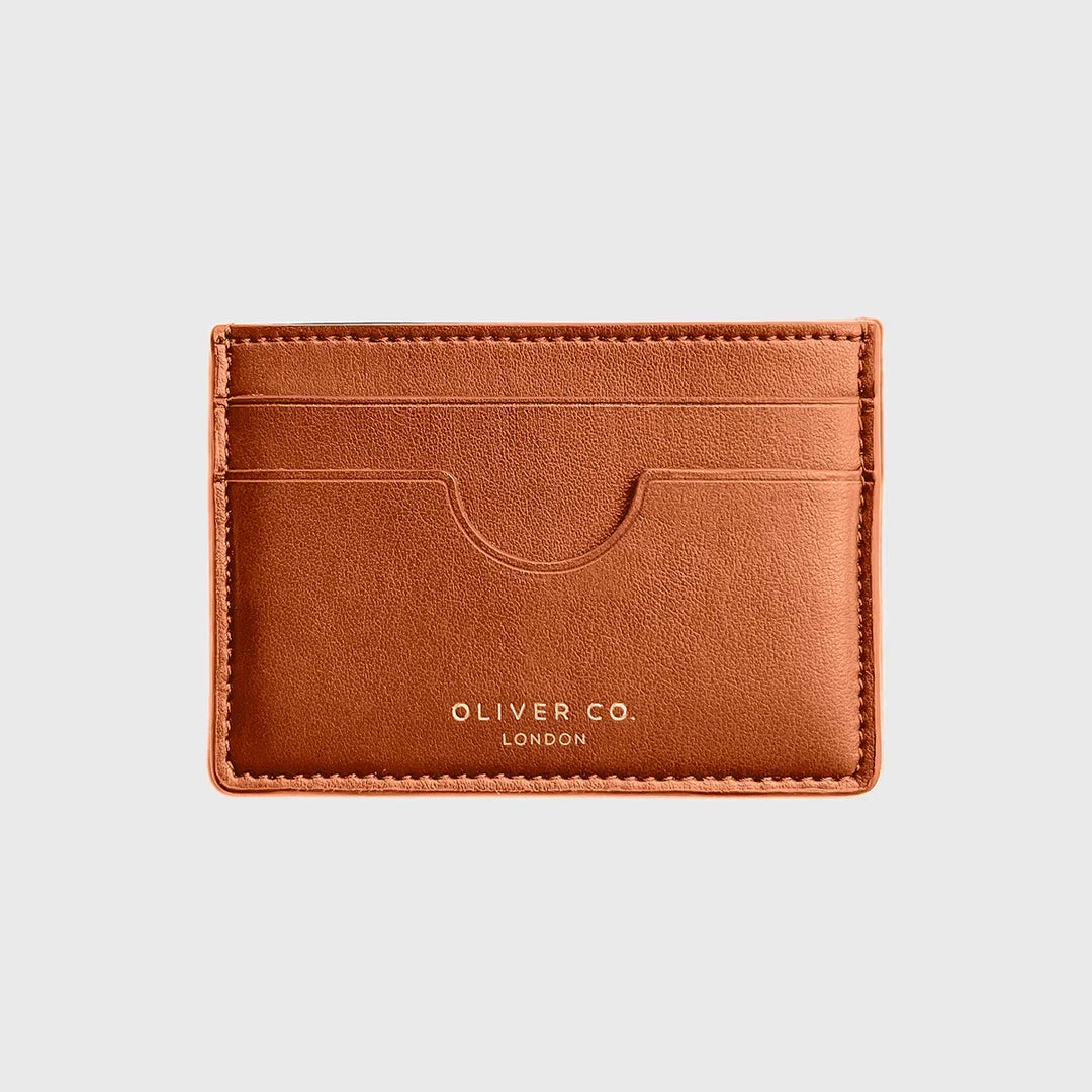 Slim burnt orange card holder wallet with multiple slots on a light background