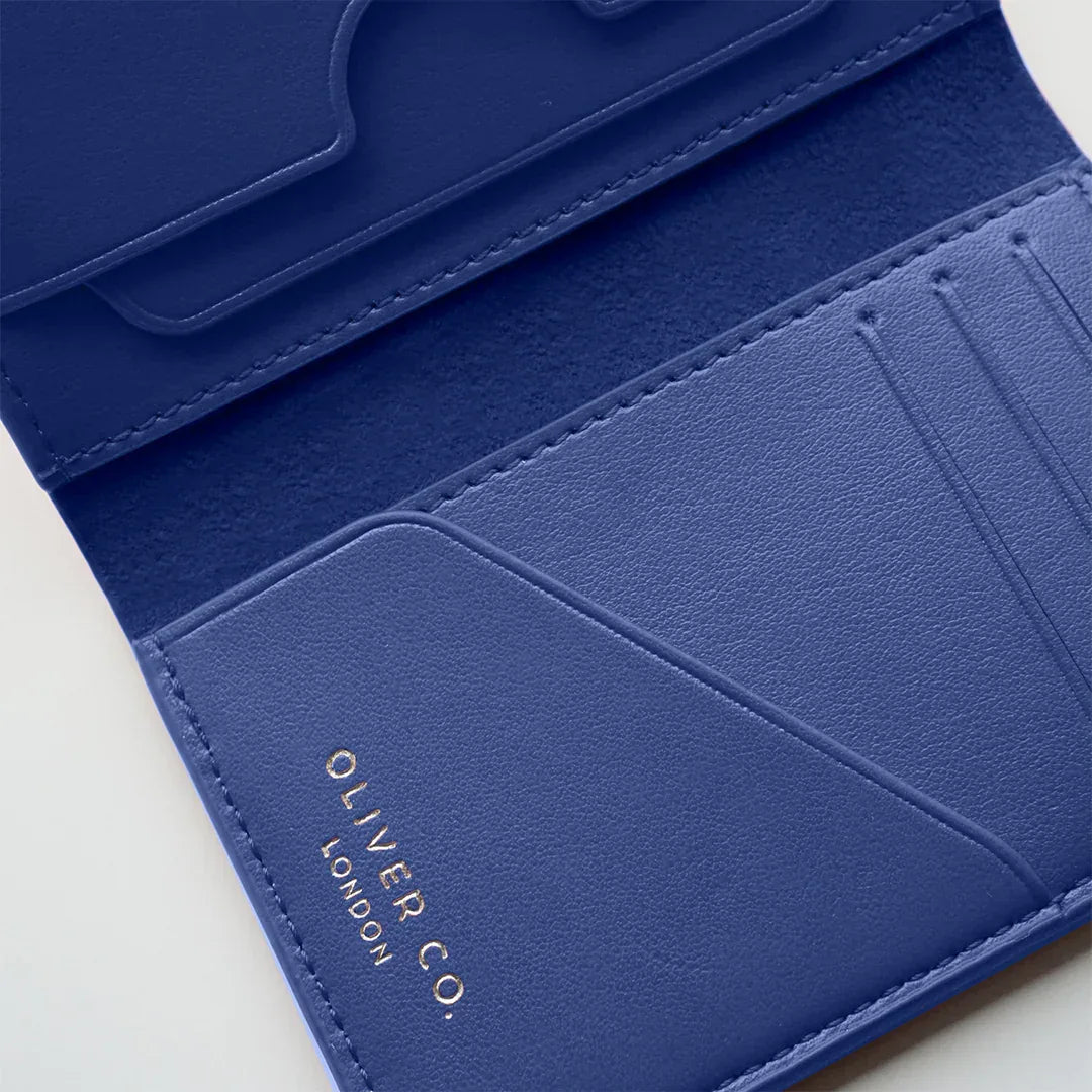 Premium cobalt blue wallet with multiple card slots and sleek interior