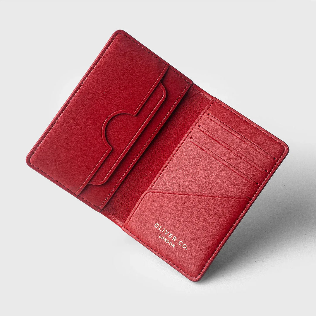 Premium red leather wallet with multiple card slots and embossed logo on light background