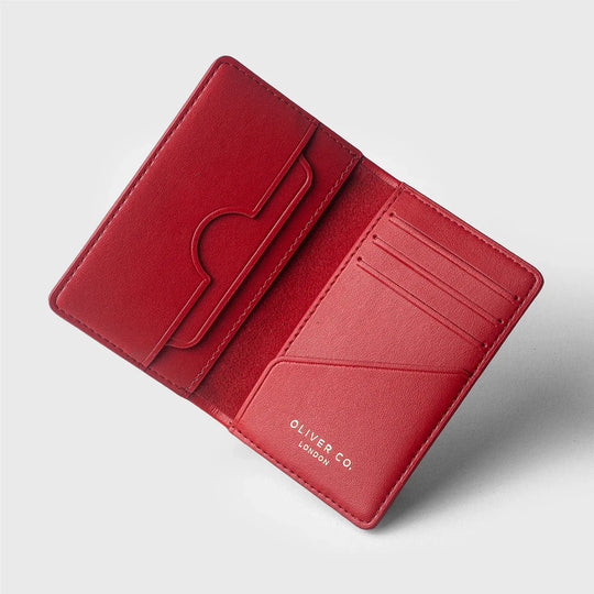 Premium red leather wallet with multiple card slots and embossed logo on light background