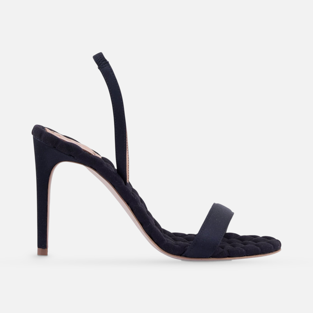 AERA VIVIEN black satin slingback sandal, side view.