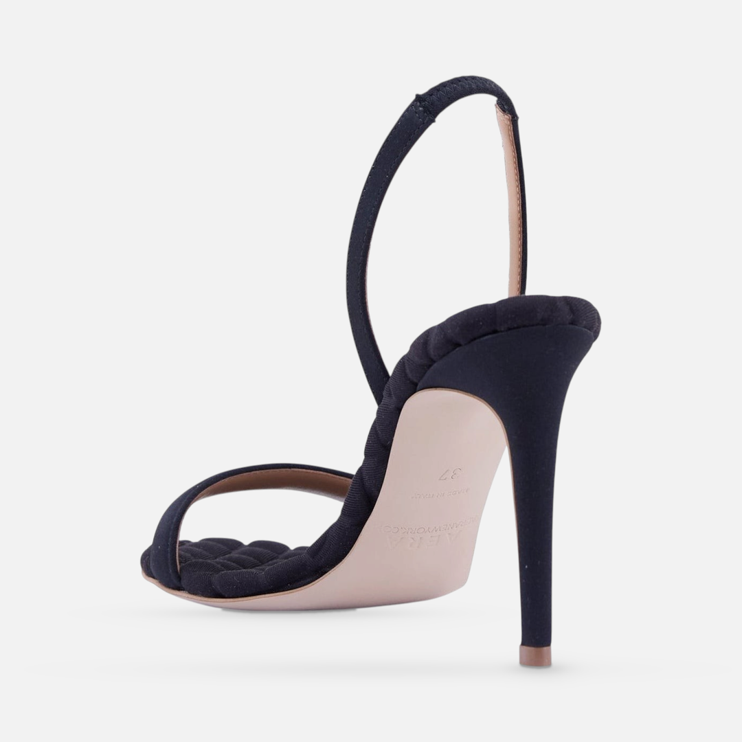 AERA VIVIEN black satin slingback sandal, rear three-quarter view showing the heel and sole.