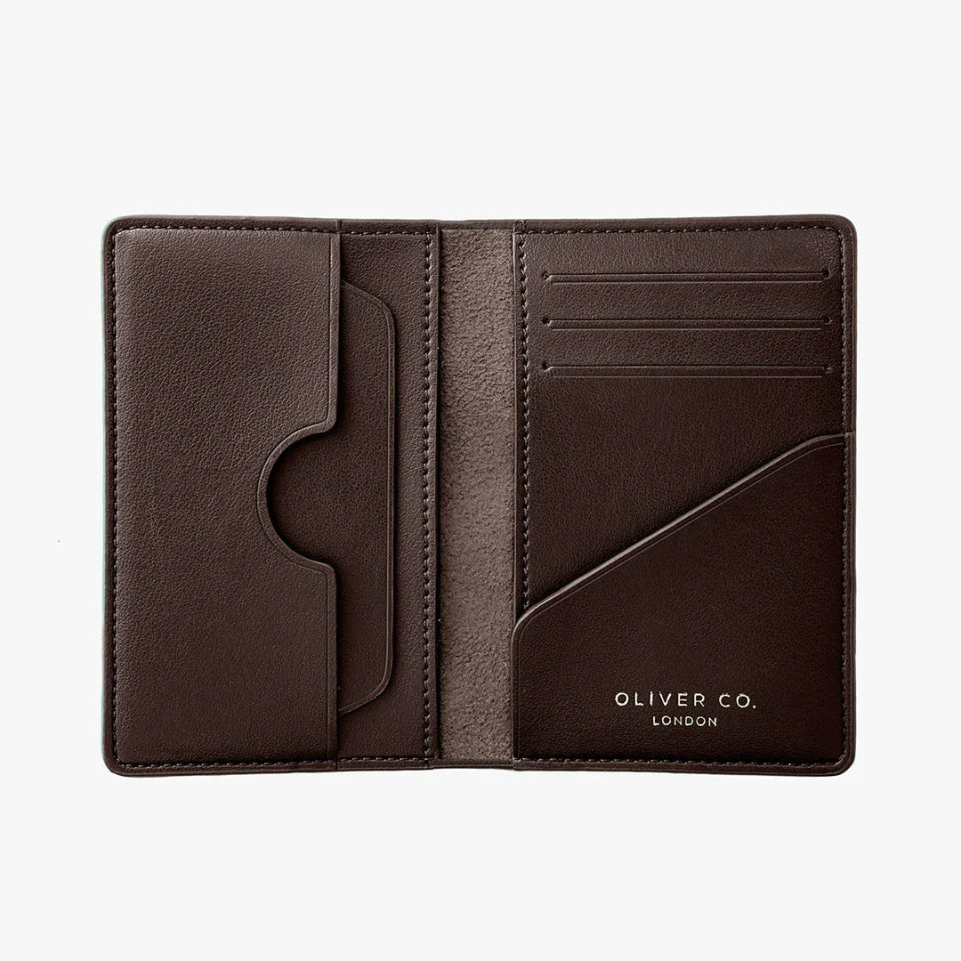 Open walnut brown compact wallet with multiple card slots and pockets on white background