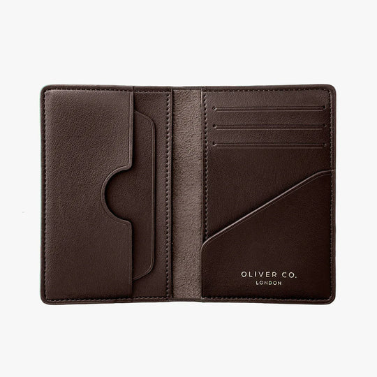 Open walnut brown compact wallet with multiple card slots and pockets on white background