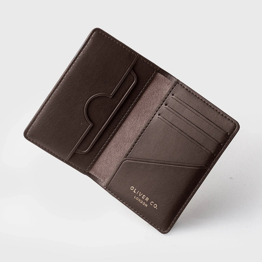 Open walnut brown compact wallet with card slots and bill compartment, minimalist design