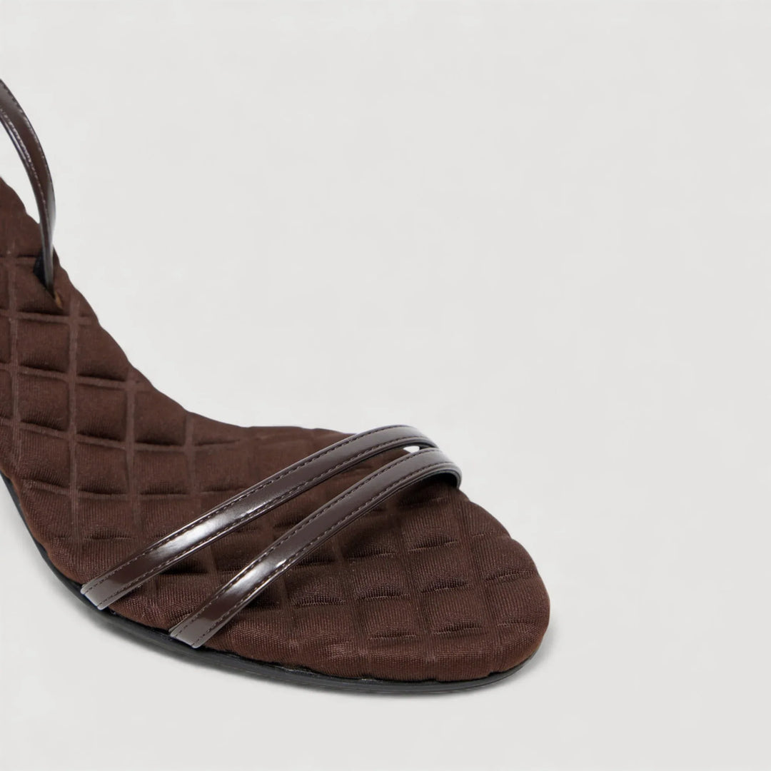 LAURA | Brown - Ankle Strap Sandal from AERA NEW YORK, luxury vegan shoes with a quilted footbed and refined ankle strap.