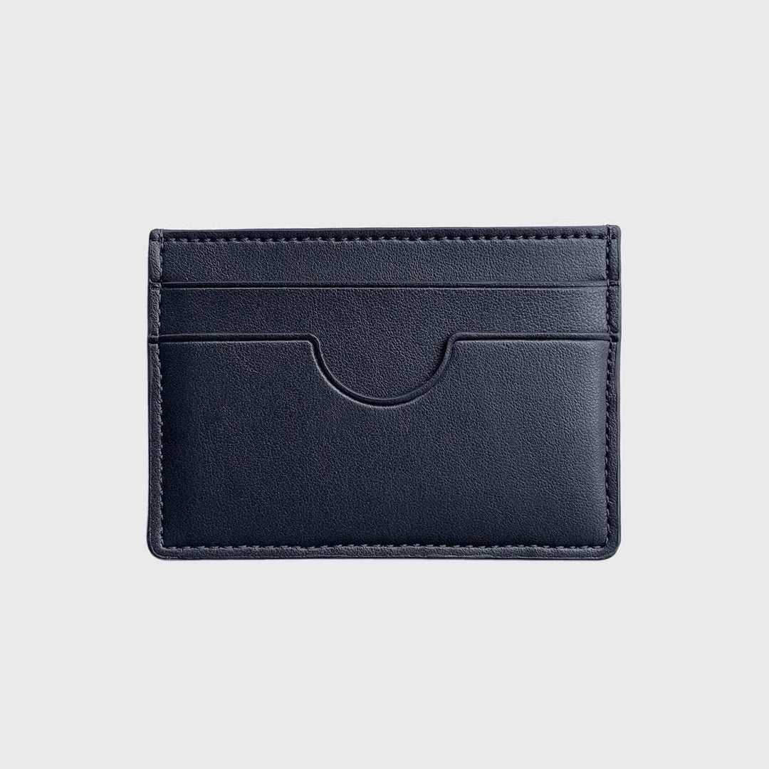 Slim black vegan card holder with multiple slots on a neutral background
