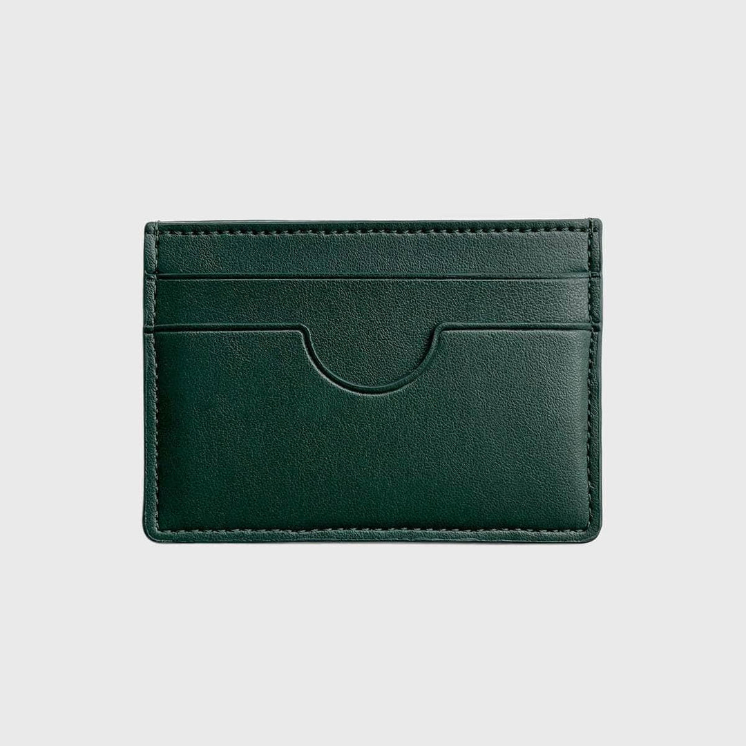 Green vegan slim card holder with multiple slots on a plain background
