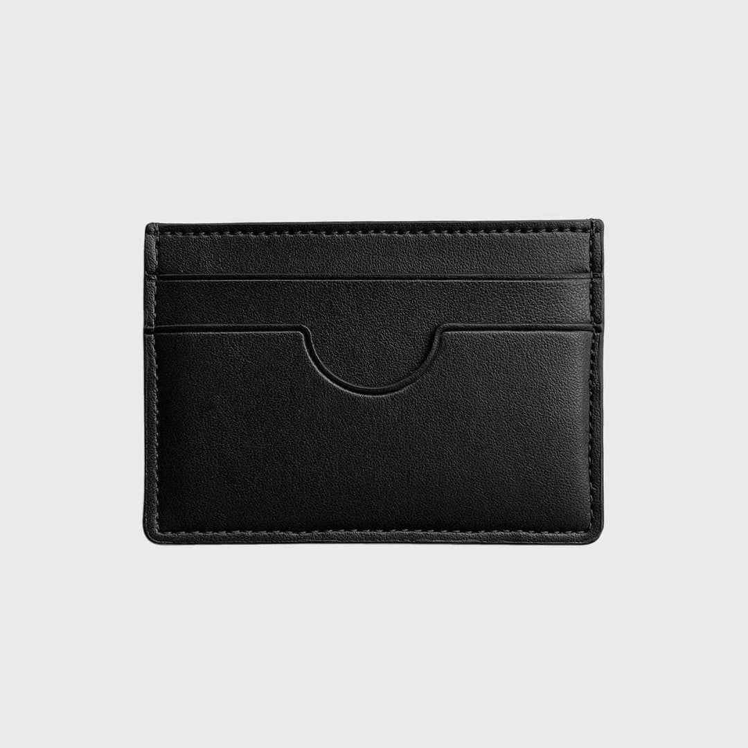 Black vegan slim card holder with multiple slots on a plain light background