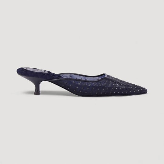 ROSA | Navy - Studded Mules by AERA NEW YORK, luxury vegan shoes with quilted insole, mesh and metal studs, side view on white background.