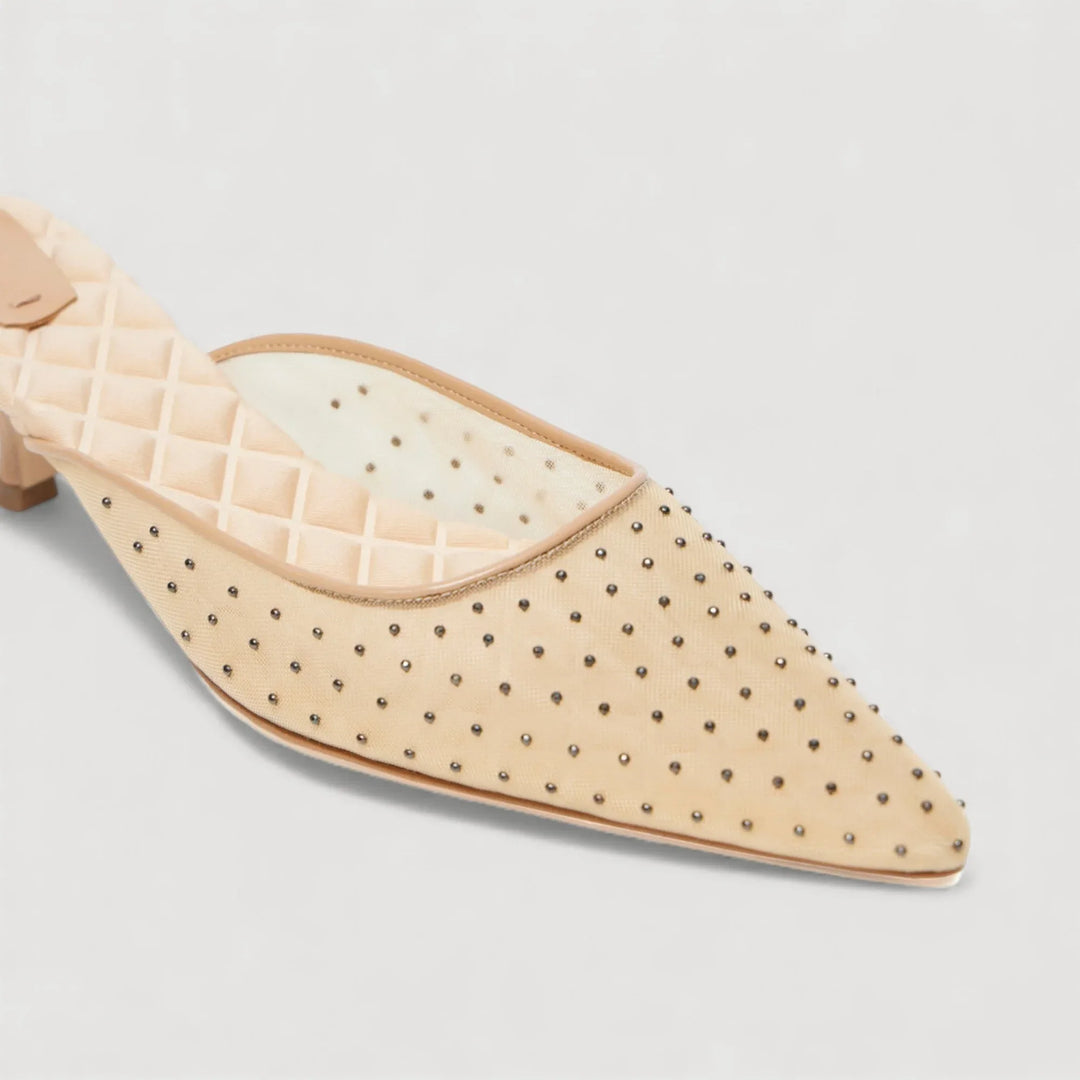 ROSA | Beige - Studded Mules by AERA NEW YORK, luxury vegan shoes featuring metal studs, open-back design, and quilted interior.